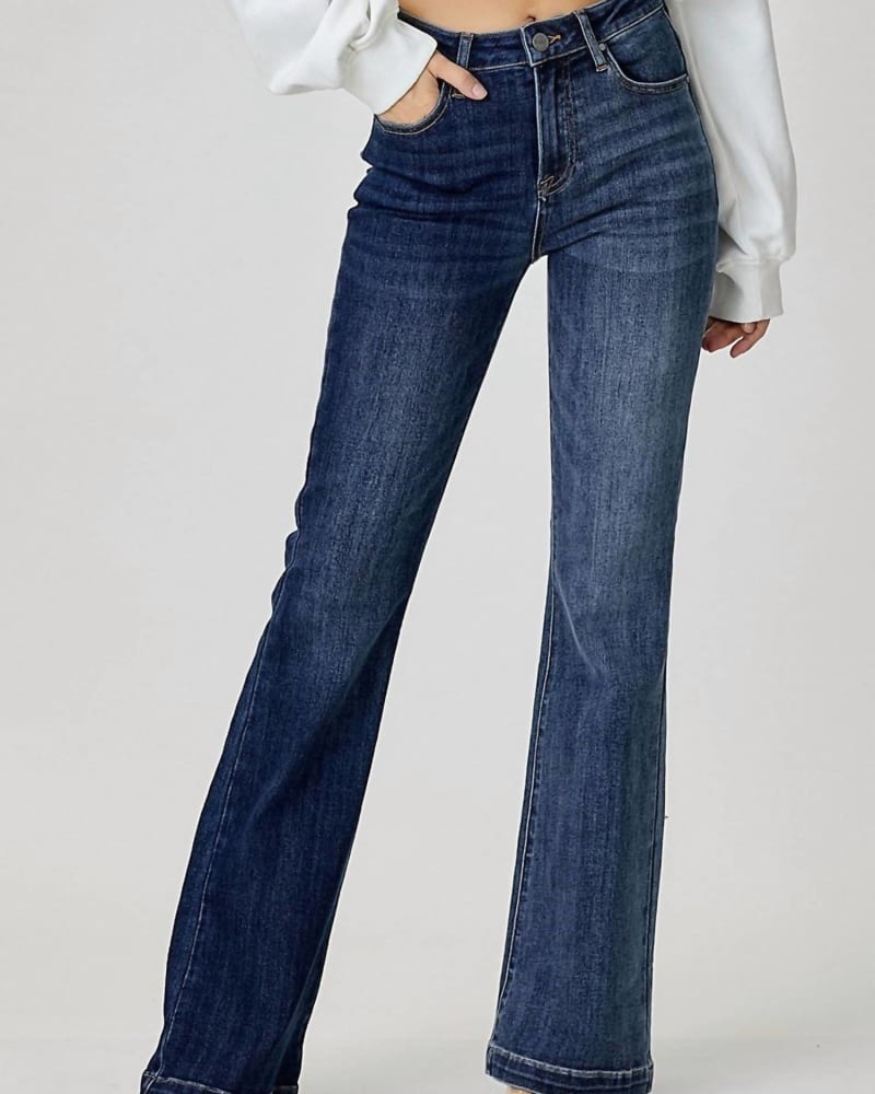 Front of a model wearing a size 20 High Rise Wide Flare Jean in Indigo Combo in Indigo Combo by RISEN. | dia_product_style_image_id:326228